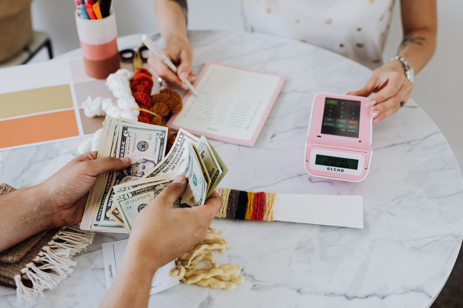Card capture that must be stored in two currencies